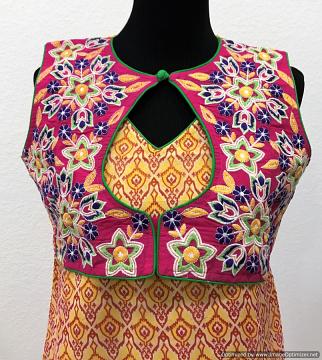 Sleeveless Yellow chiffon kurti with Pink jacket front view
