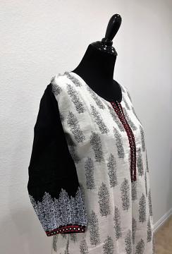 side view - Off White Linen Block Print Kurti With Red Border and Leggings