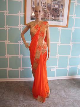 Festive orange gold party wear saree Festive orange gold party wear saree