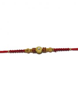 Traditional RAKHI Designed With Red Colored Stones and Beads for Brother Traditional RAKHI Designed With Red Colored Stones and Beads for Brother
