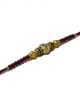 Traditional RAKHI Designed With Brown Colored Stones and Beads for Brother