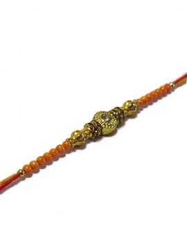 Traditional RAKHI Designed With Orange Colored Stones and Beads for Brother