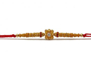 RAKHI Designed in Gold With Beautiful Light Brown Beads