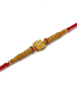 RAKHI Designed in Gold With Beautiful Light Brown Beads