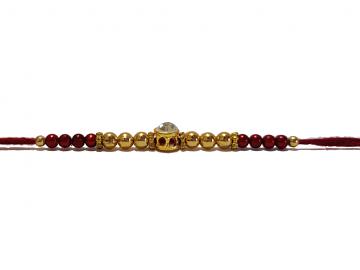 Diamond RAKHI Designed With Golden and Brown Beads