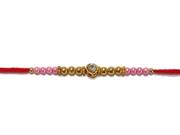 Diamond RAKHI Designed With Golden and Pink Beads