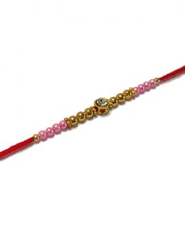 Diamond RAKHI Designed With Golden and Pink Beads