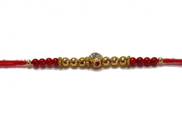 Diamond RAKHI Designed With Golden and Red Beads
