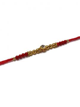 Diamond RAKHI Designed With Golden and Red Beads