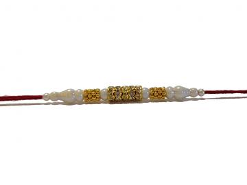 Traditional RAKHI in Gold W/ Diamonds and White Beads