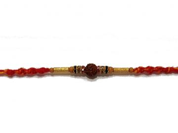 Traditional RAKHI Crafted in Gold W/ Rudraksha and Diamonds Traditional RAKHI Crafted in Gold W/ Rudraksha and Diamonds