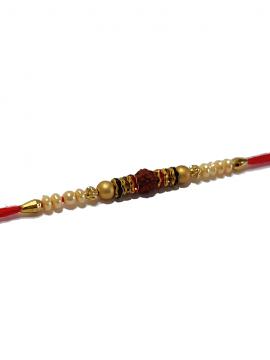 Traditional RAKHI Crafted in Gold W/ Rudraksha & beads Traditional RAKHI Crafted in Gold W/ Rudraksha & beads