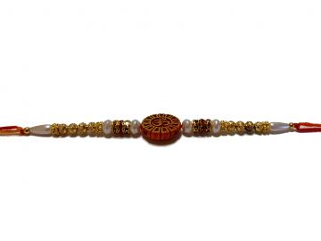 Om Carved RAKHI With Beads and Diamonds