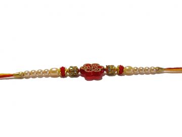 Swastika Carved RAKHI With Beads and Diamonds Swastika Carved RAKHI With Beads and Diamonds