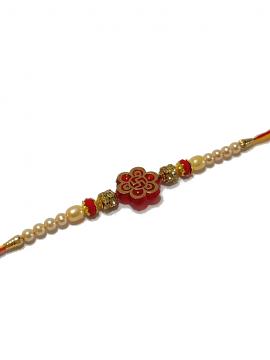 Swastika Carved RAKHI With Beads and Diamonds Swastika Carved RAKHI With Beads and Diamonds