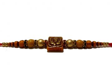 Ganesh RAKHI W/ Gold and Wooden Beads