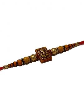 Ganesh RAKHI W/ Gold and Wooden Beads