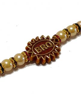 Golden Carved Rakhi for Your Bro