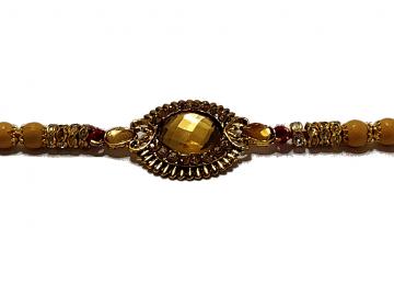 Aesthetic Rakhi W/ a Amber Gem Stone Surrounded in Gold