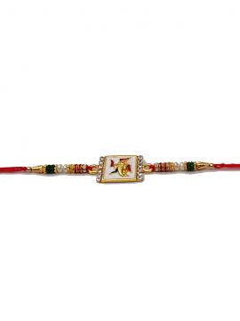 Spiritual Mina RAKHI W/ Load Ganesh in Gold