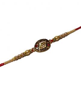 Antique Rakhi in Gold Surrounded with White Pearls