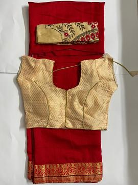 Red saree and creme readymade blouse