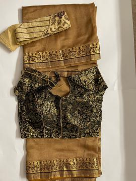 Gold saree and creme readymade blouse