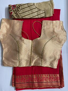 Dark red saree and creme readymade blouse