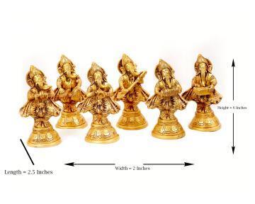 Brass ganpati statue set playing musical instrument