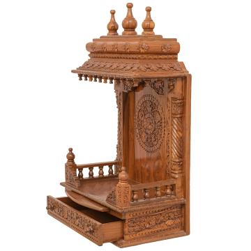 Feature the gopura wooden mandir positioned to the left side of the image