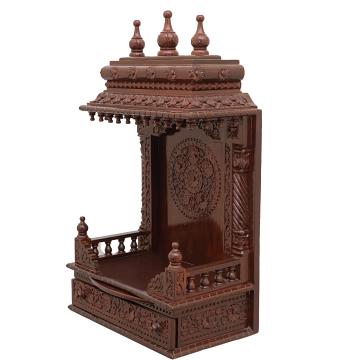 Feature the gopura wooden mandir positioned to the left side of the image