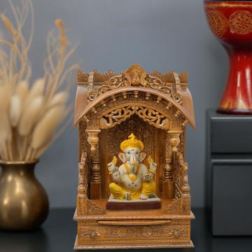 Illustrate the torana mandir in a lifestyle setting, such as a well-designed living room or prayer room