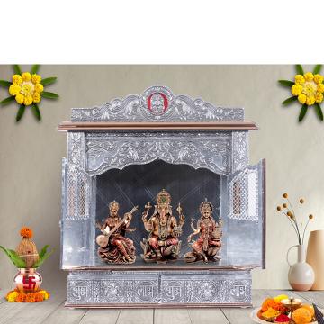 Illustrate the copper oxidized mandir in a lifestyle setting, such as a well-designed living room or prayer room Illustrate the copper oxidized mandir in a lifestyle setting, such as a well-designed living room or prayer room