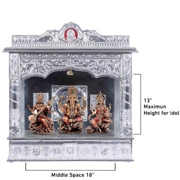 Show the interior of the Pure Silver Color Mandir with a deity or spiritual figure prominently displayed.