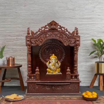 Illustrate the mandap wooden mandir in a lifestyle setting, such as a well-designed living room or prayer room