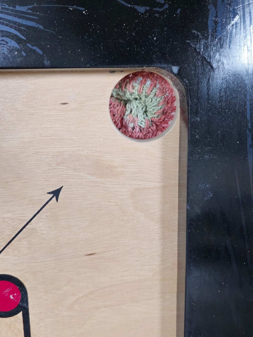 Carrom board round pockets