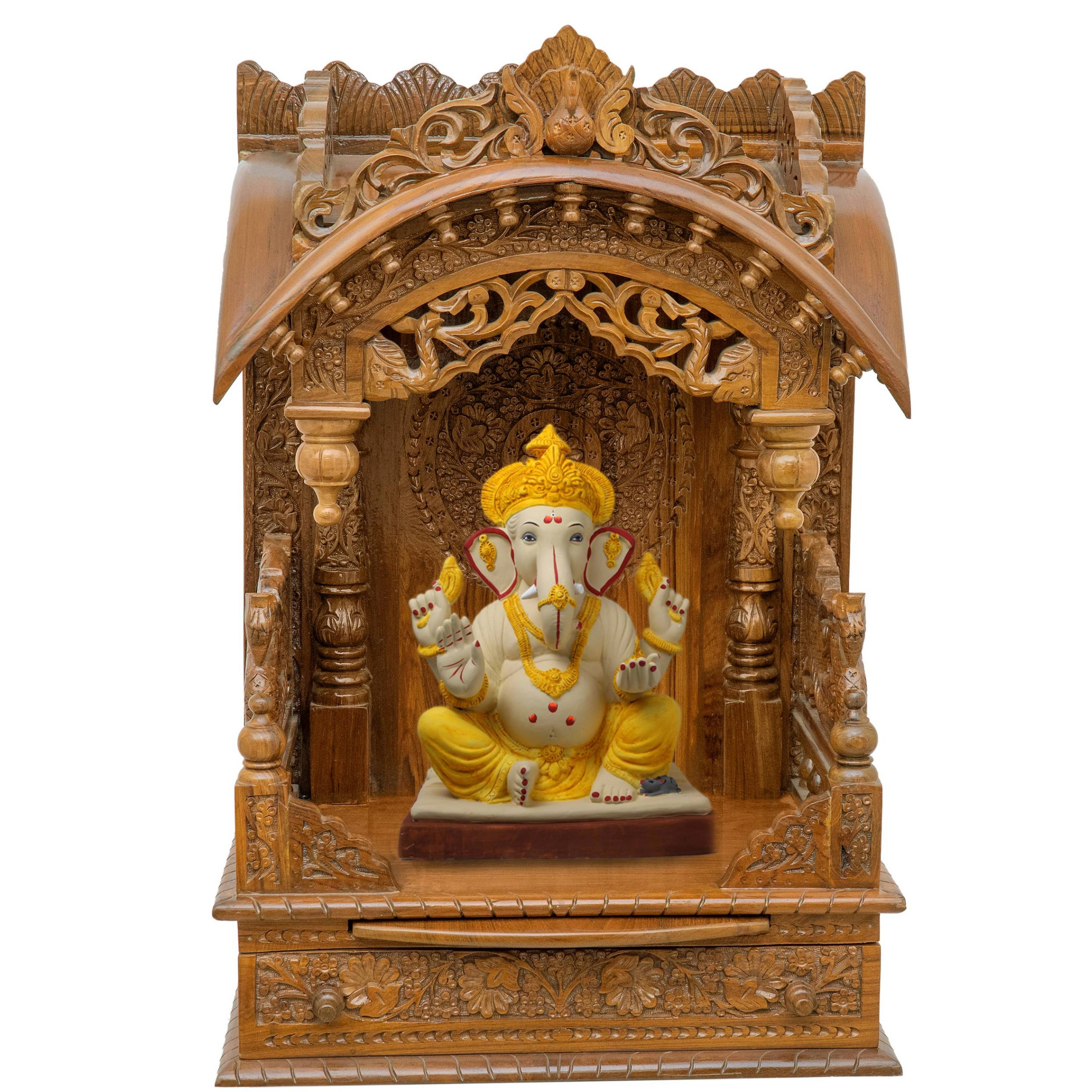 Show the interior of the torana wooden mandir with a deity or spiritual figure prominently displayed.