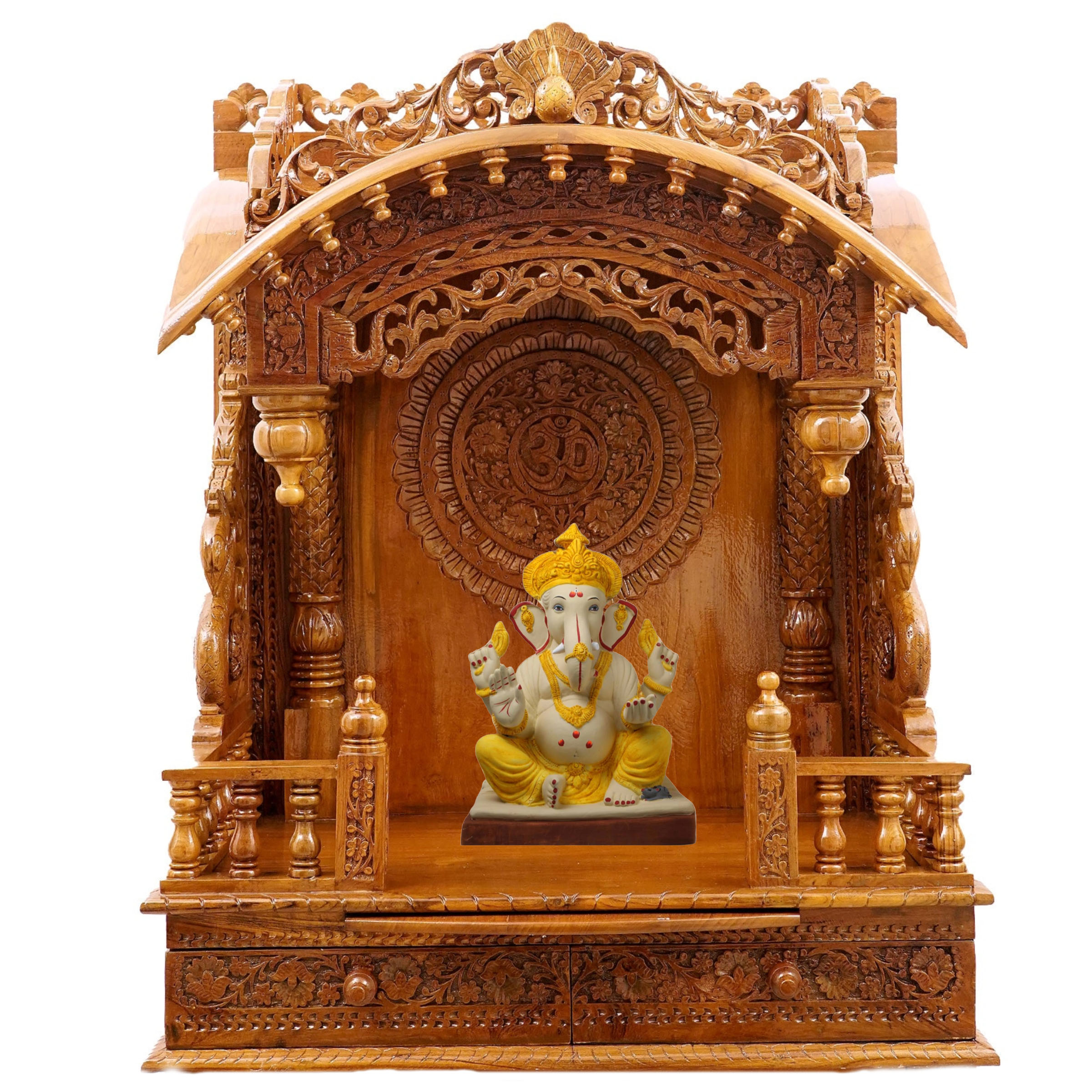 Show the interior of the torana wooden mandir with a deity or spiritual figure prominently displayed.