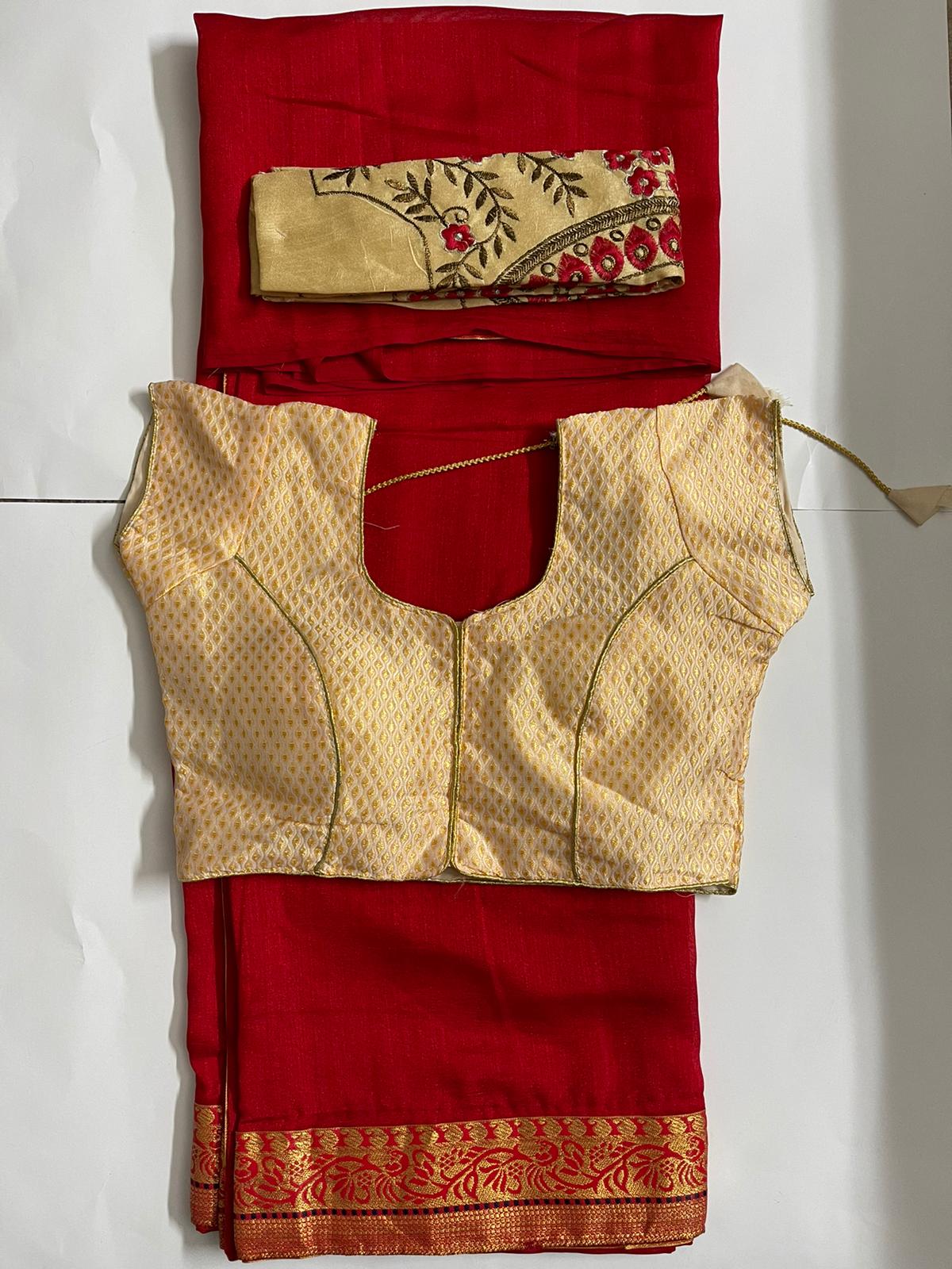 Red saree and creme readymade blouse