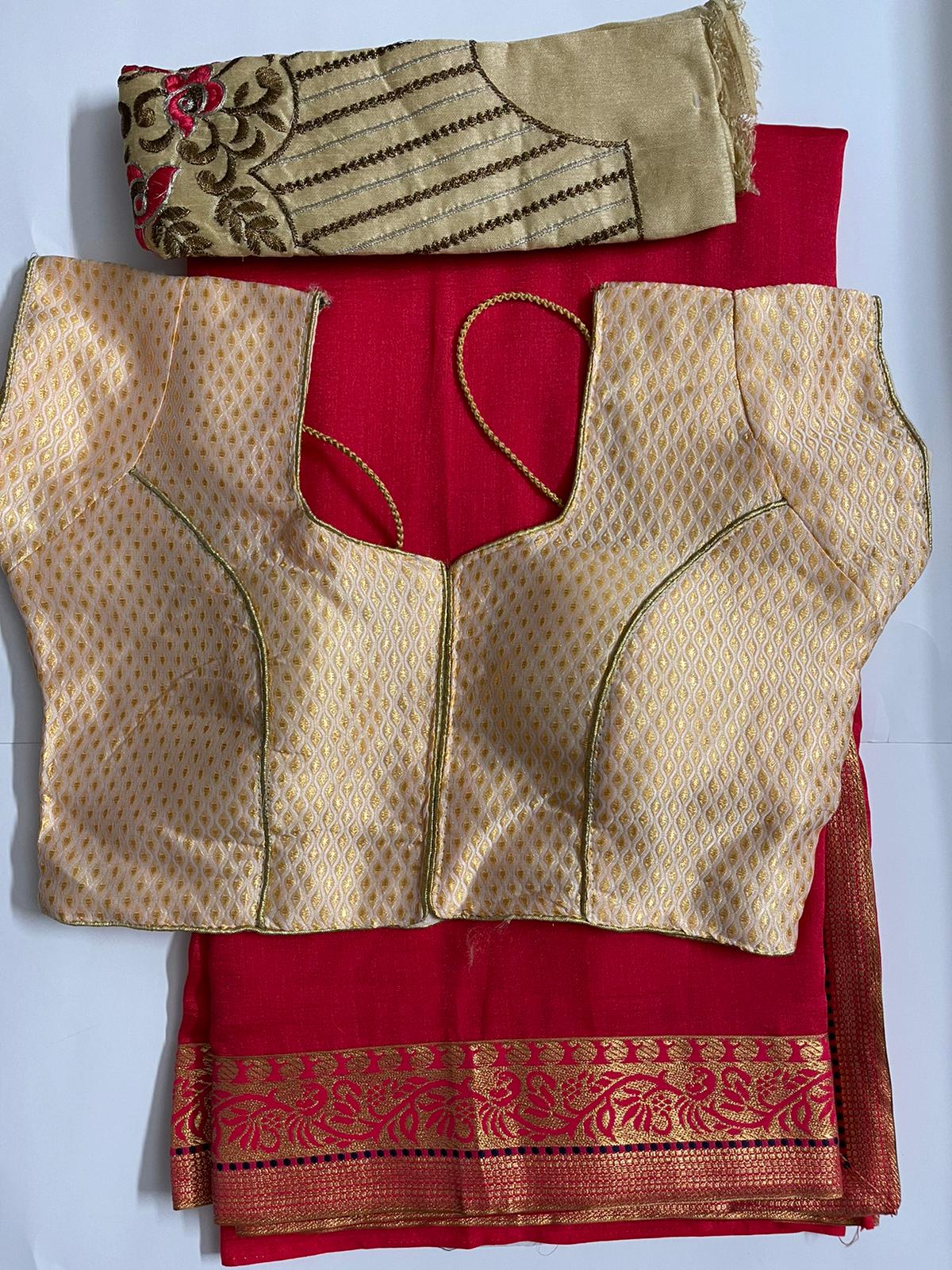 Dark red saree and creme readymade blouse