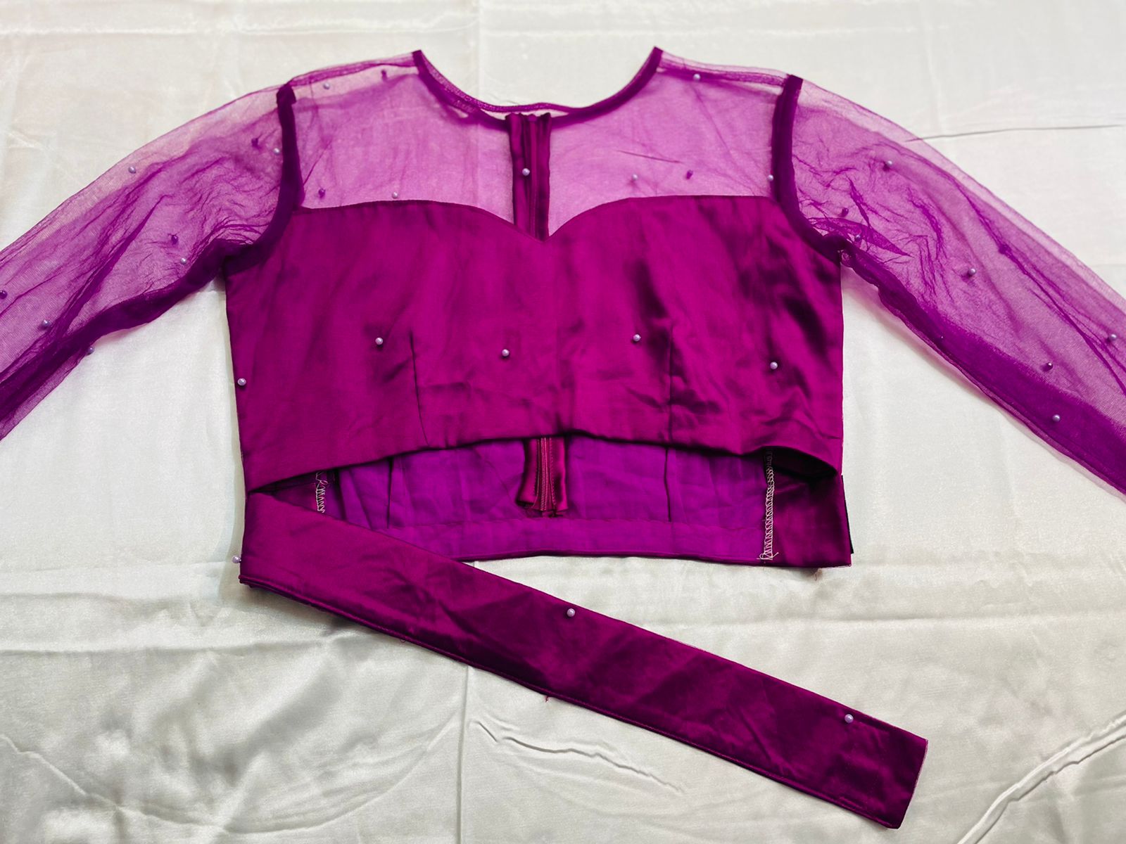 Close pic blouse belt attached