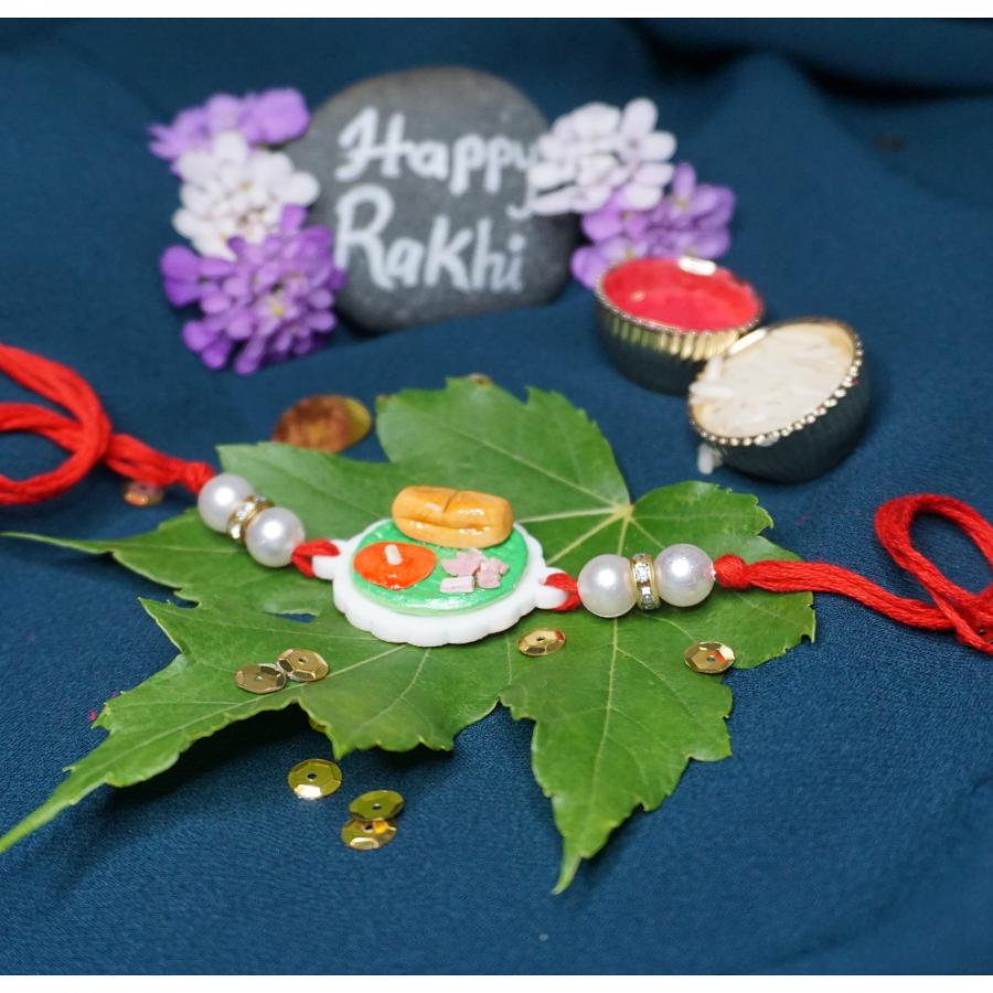 FOOD RAKHI - Pav Bhaji Style for the food lovers With Roli + Chaval FOOD RAKHI - Pav Bhaji Style for the food lovers With Roli + Chaval