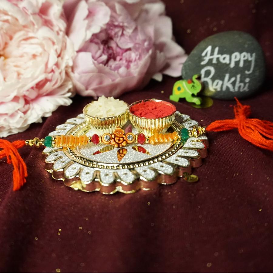 Special Ganesh Rakhi W/ Colorful Beads + Roli & Chaval Special Ganesh Rakhi W/ Colorful Beads + Roli & Chaval