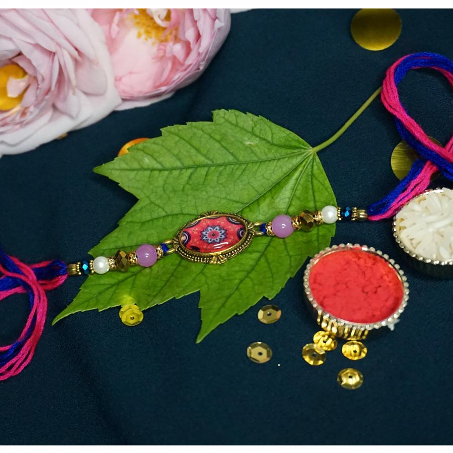 Fancy Rajwadi Rakhi W/ a Beautiful Gems Surrounded By Stones + Roli/Chaval