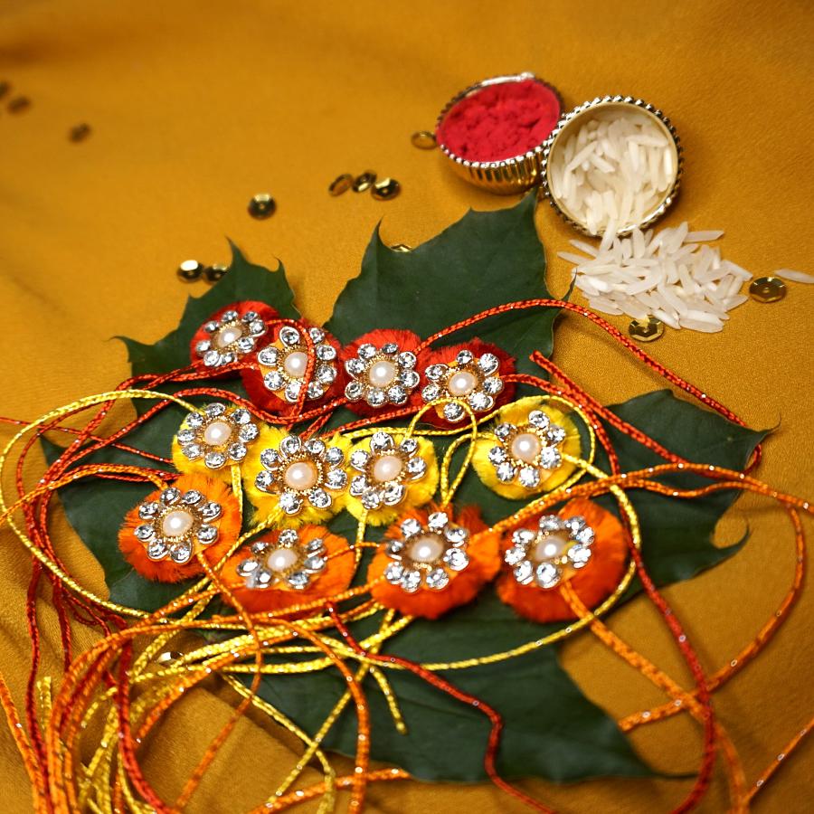 Auspicious Flower Rakhi W/ Elegant thread work + Roli & Chaval