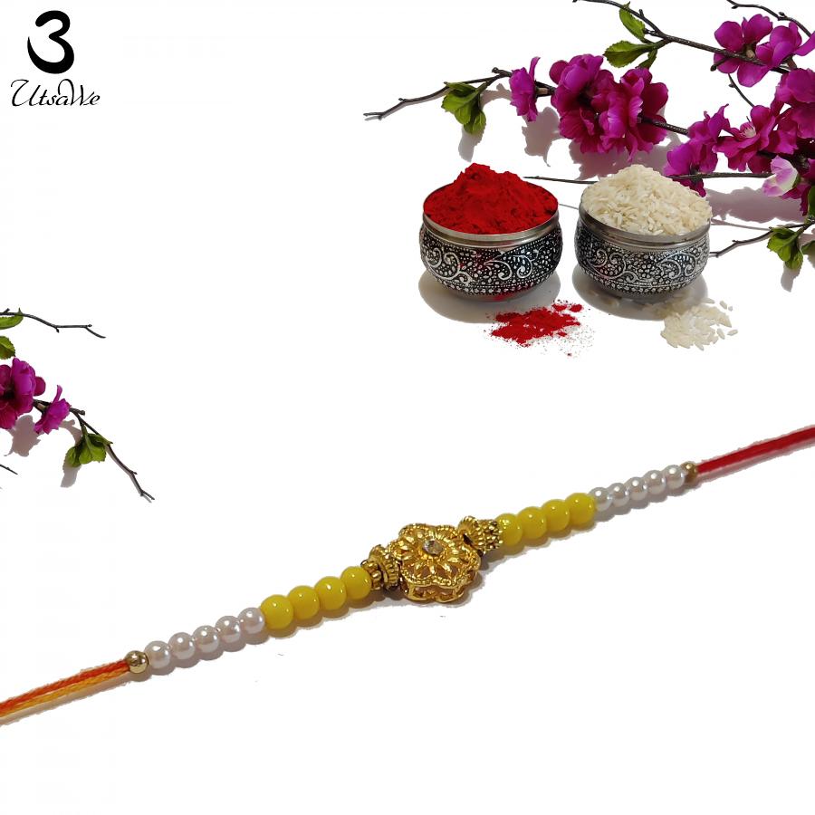 Golden Flower Design RAKHI for Brother w/ Roli & Chawal Golden Flower Design RAKHI for Brother w/ Roli & Chawal