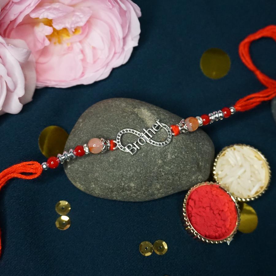 Infinite Love Brother Rakhi in Silver With Beads + Roli/Chaval