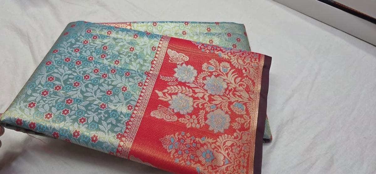 New Meenakari Designs in Sea-green/teal base with floral motifs Pattu saree