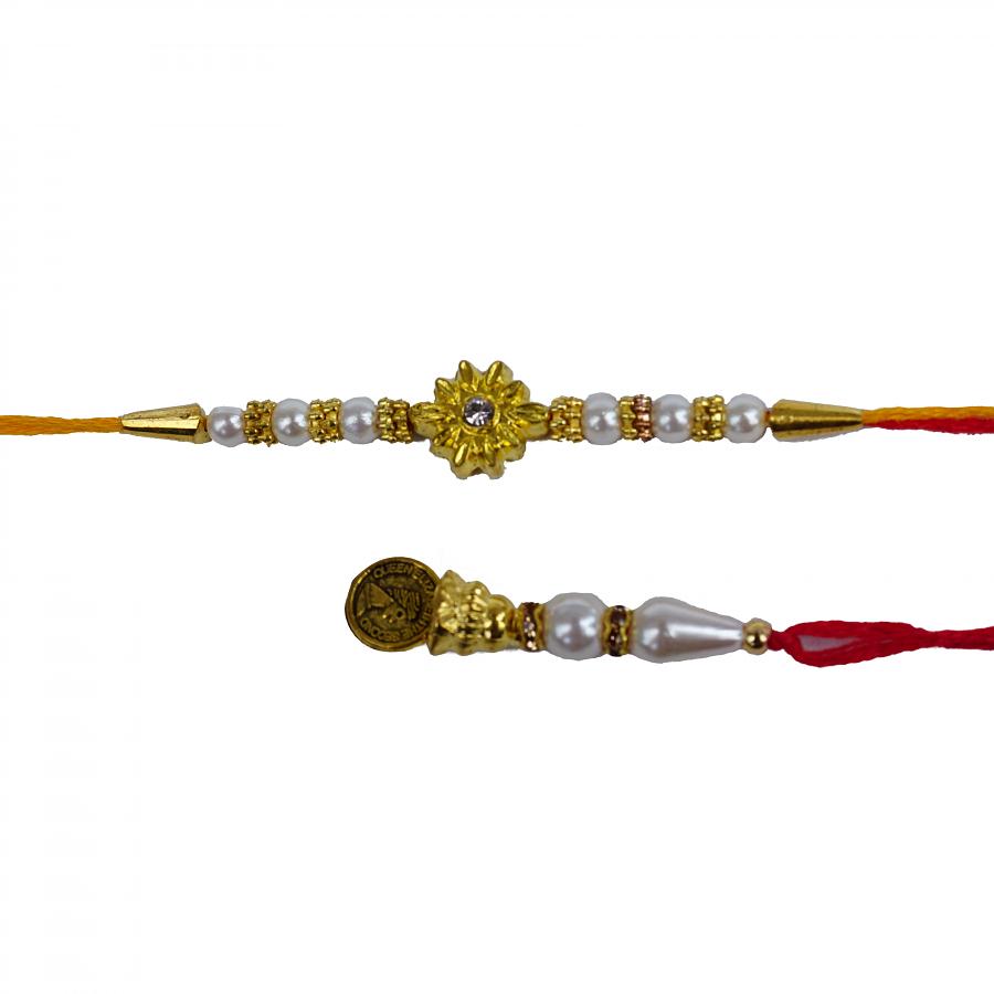 Lumba RAKHI Crafted in Golden Sun Like Flower & White Beads +Roli & Chaval Lumba RAKHI Crafted in Golden Sun Like Flower & White Beads +Roli & Chaval