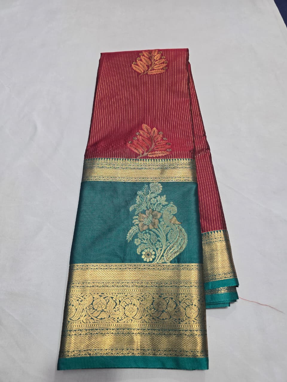 Maroon/burgundy with teal antique gold zari border